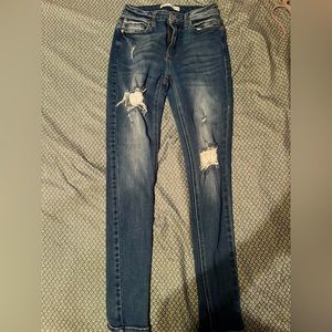 ripped blue skinny jeans